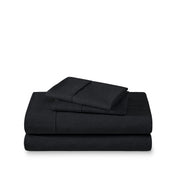 Set of bed sheets folded on a white background