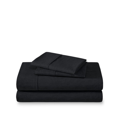 Set of bed sheets folded on a white background