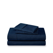 Set of bed sheets folded on a white background