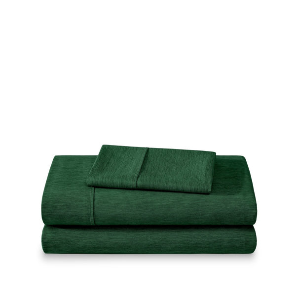 Set of bed sheets folded on a white background