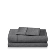 Set of bed sheets folded on a white background