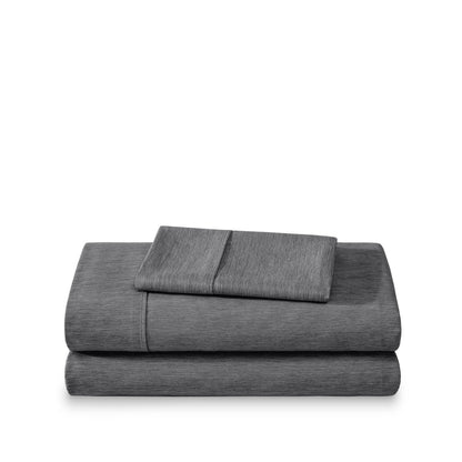 Set of bed sheets folded on a white background