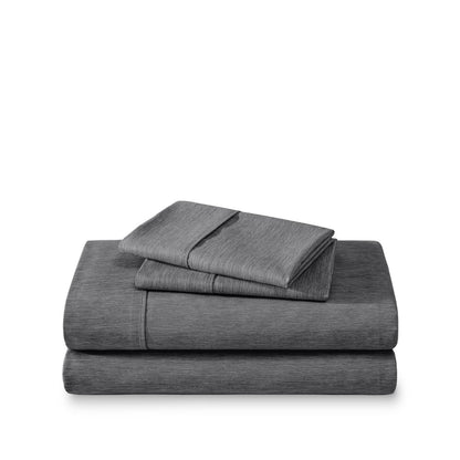 Set of bed sheets folded on a white background