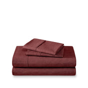 Set of bed sheets folded on a white background