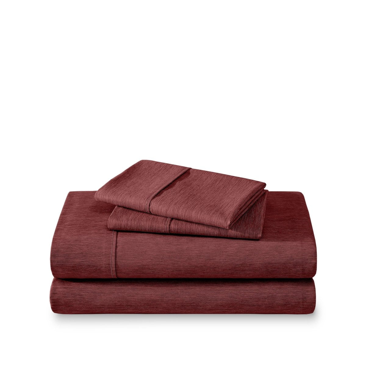 Set of bed sheets folded on a white background