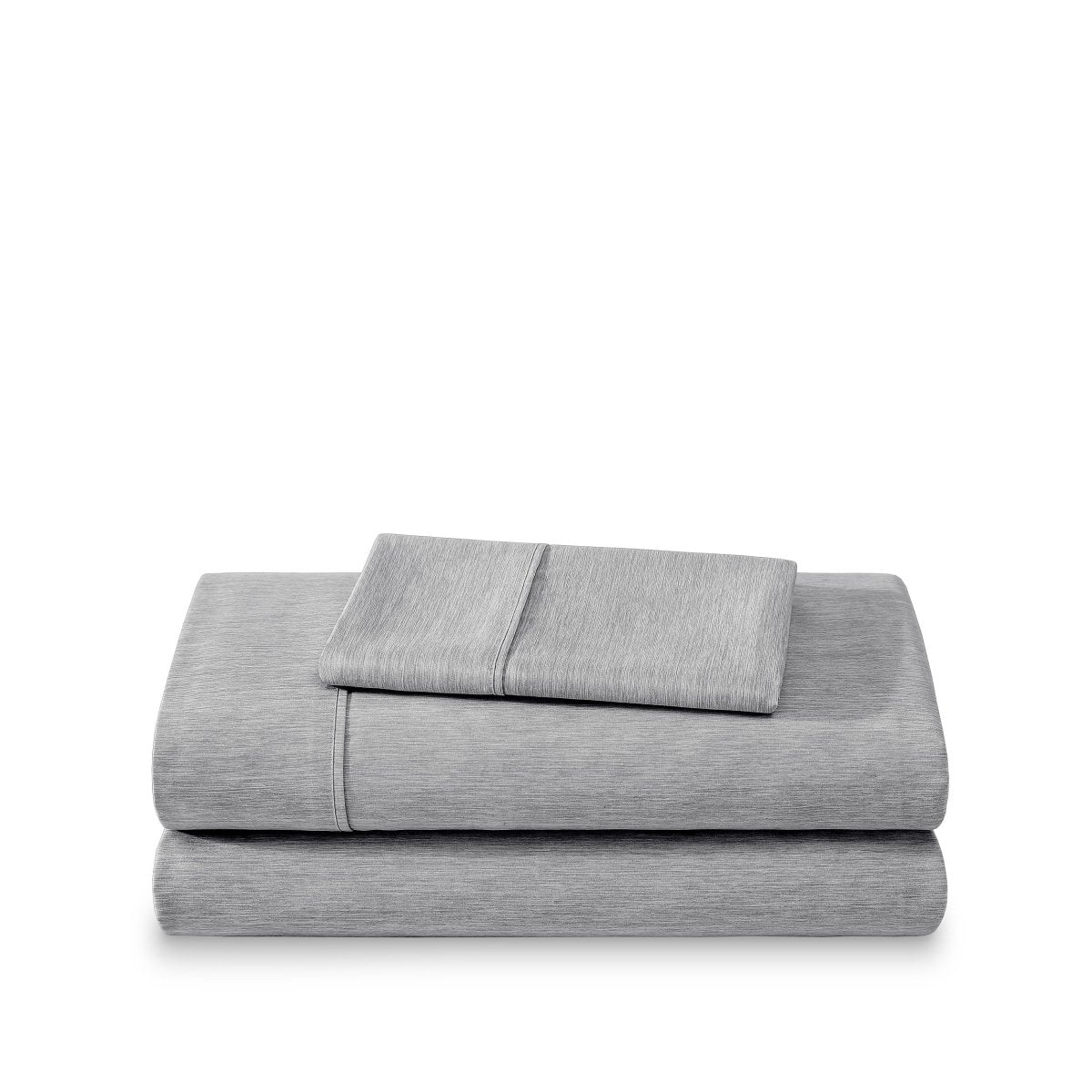 Set of bed sheets folded on a white background