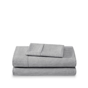 Set of bed sheets folded on a white background