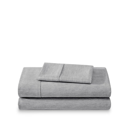 Set of bed sheets folded on a white background