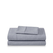 Set of bed sheets folded on a white background