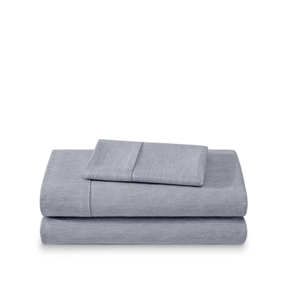 Set of bed sheets folded on a white background