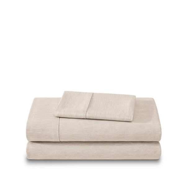 Set of bed sheets folded on a white background
