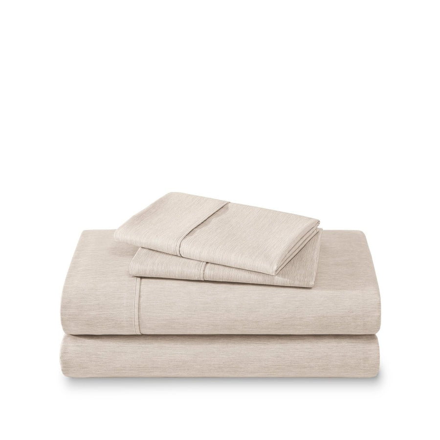 Set of bed sheets folded on a white background