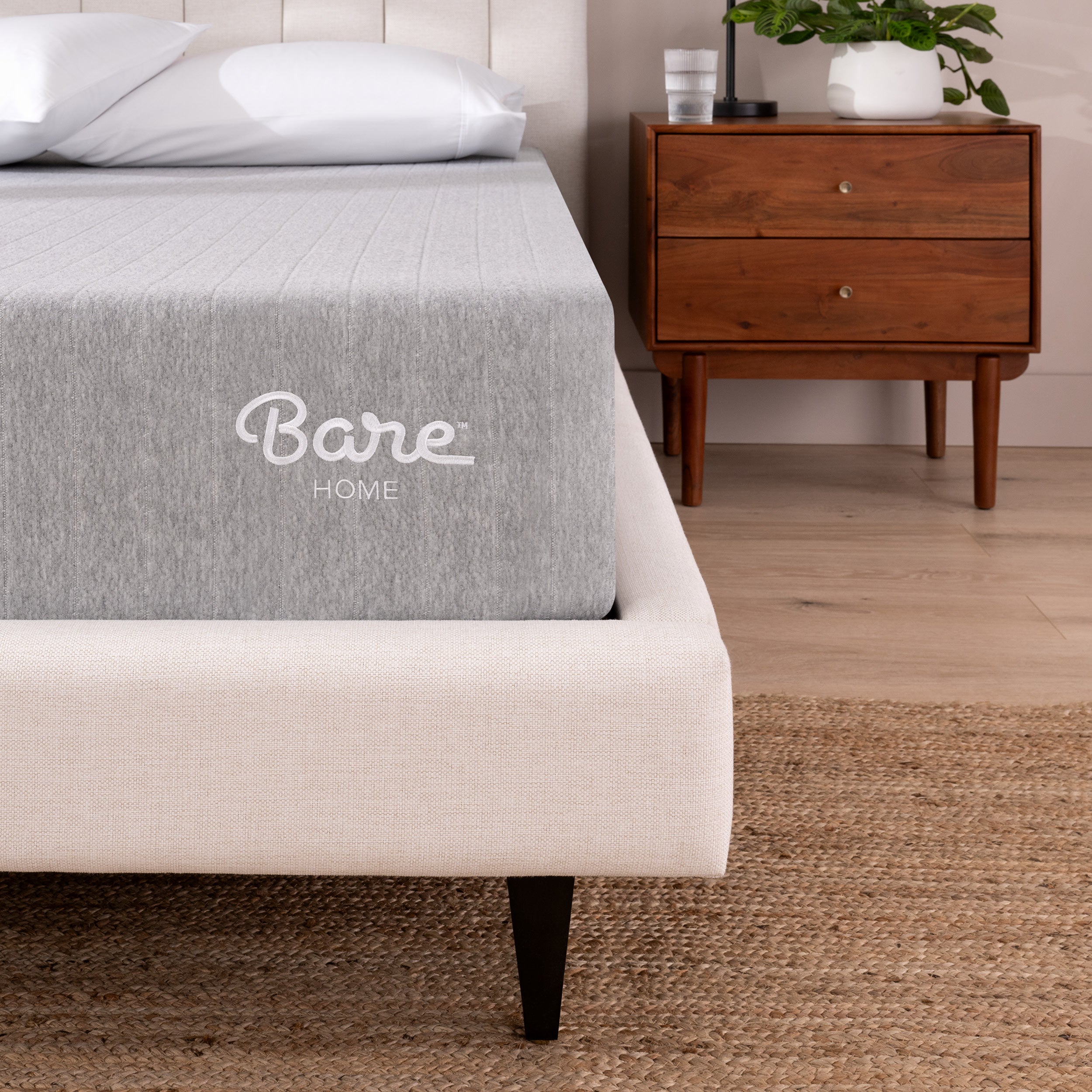 Mattress with a Bare Home mattress cover in a bedroom