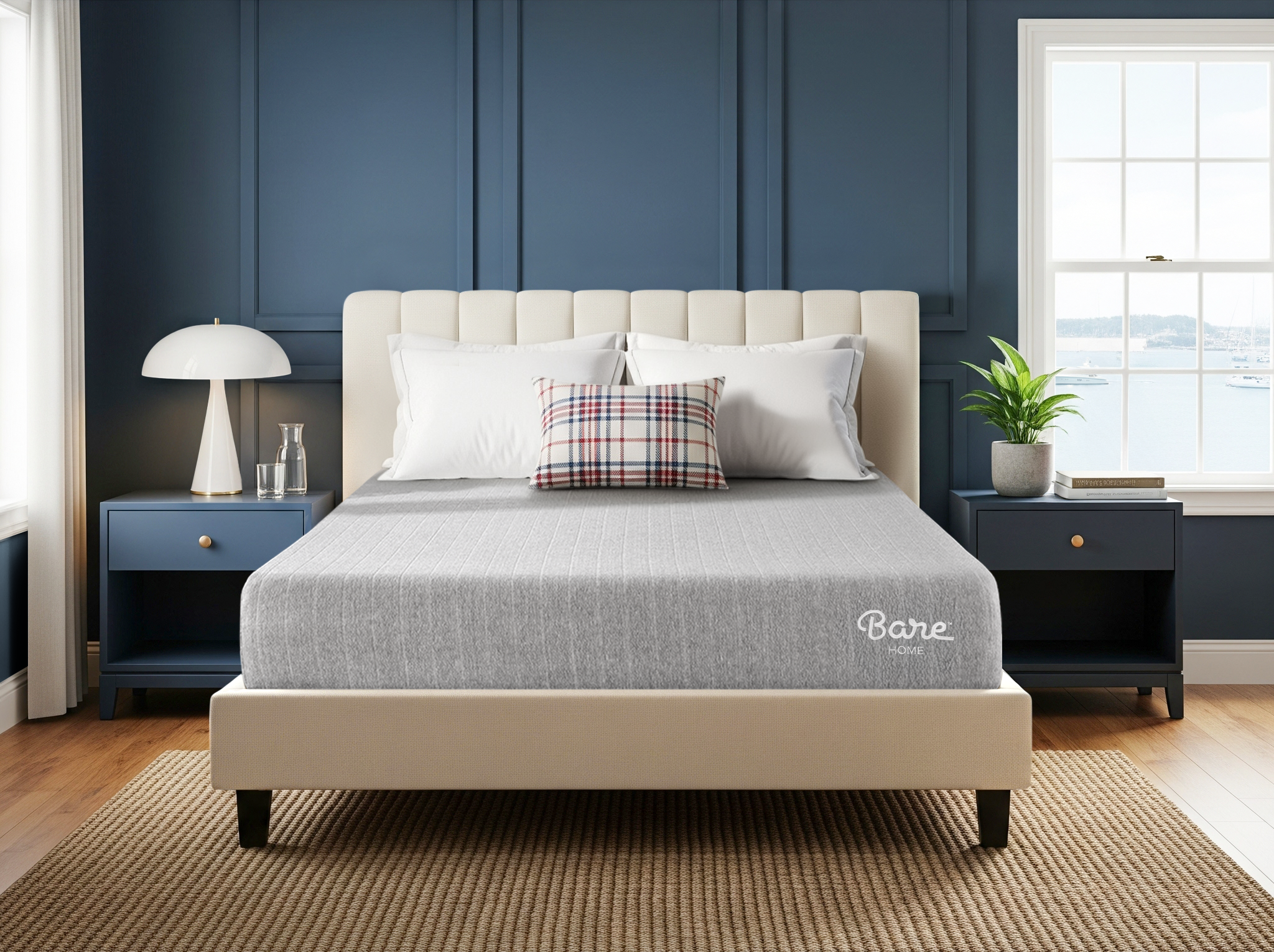 Beige bed frame with gray mattress cover in a bedroom setting