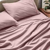 Close up of a microfiber sheet set on a bed