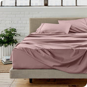 A modern bedroom with microfiber sheets on the mattress