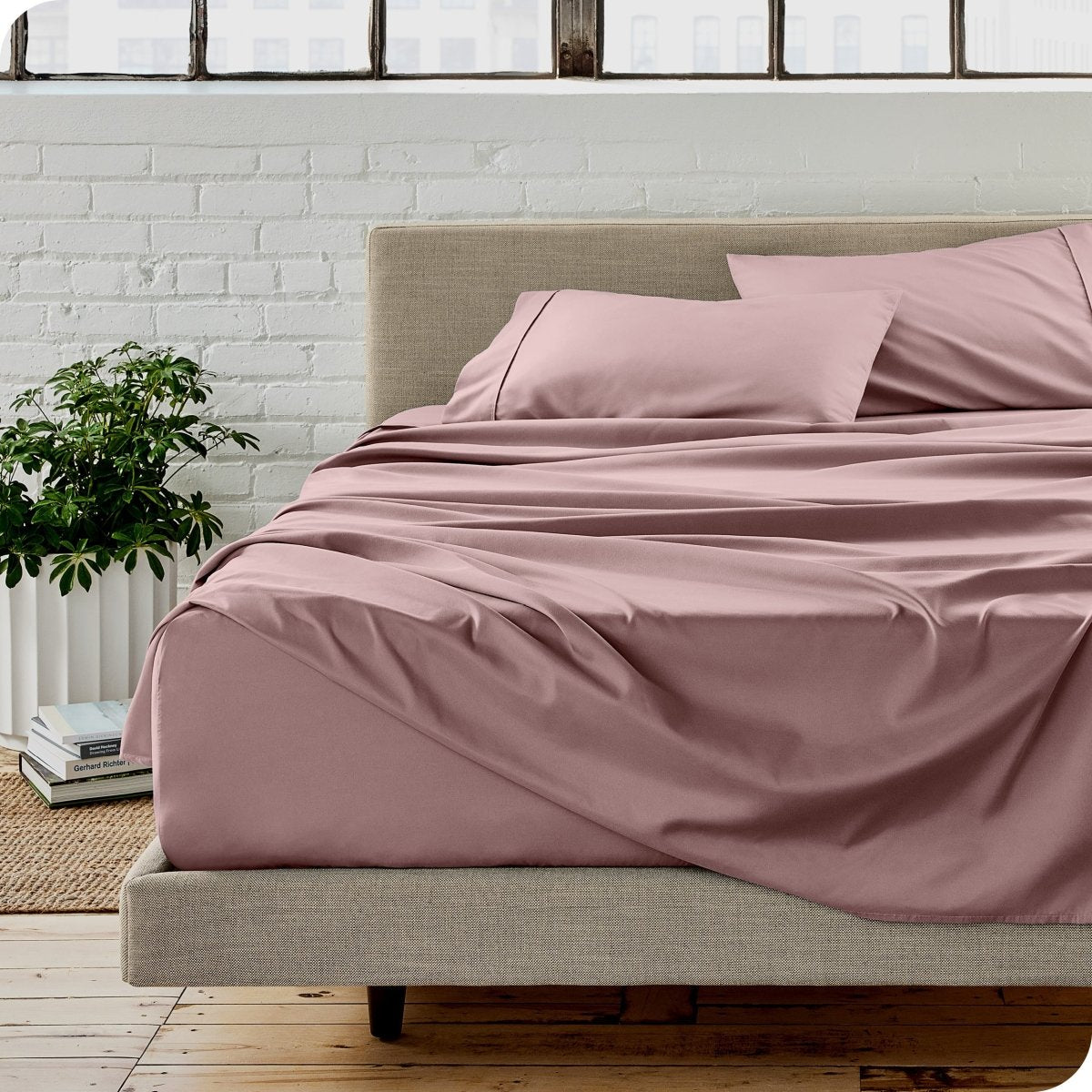 A modern bedroom with microfiber sheets on the mattress