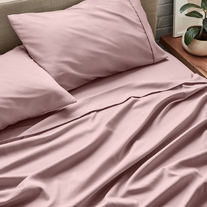 Close up of ultra-soft sheets on a bed