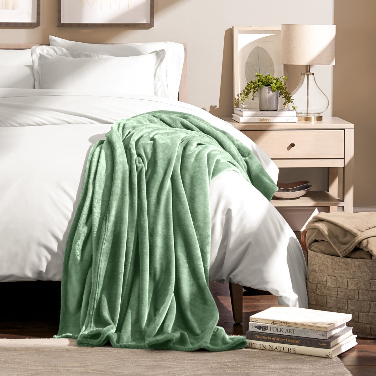 Microplush blanket draped over the corner of a bed