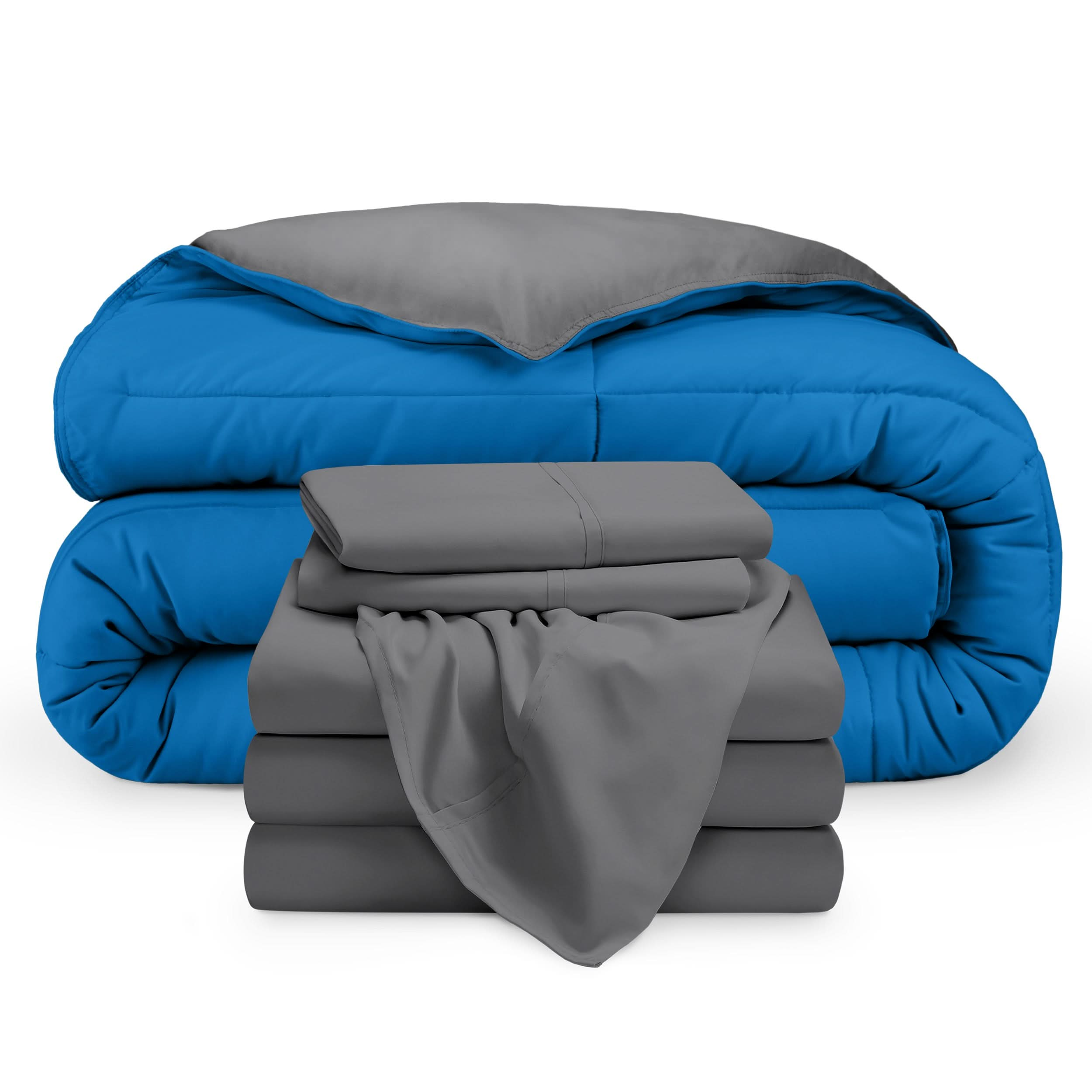 A reversible microfiber comforter and a coordinating sheet set folded and stacked