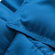 A close up of a corner of the microfiber comforter