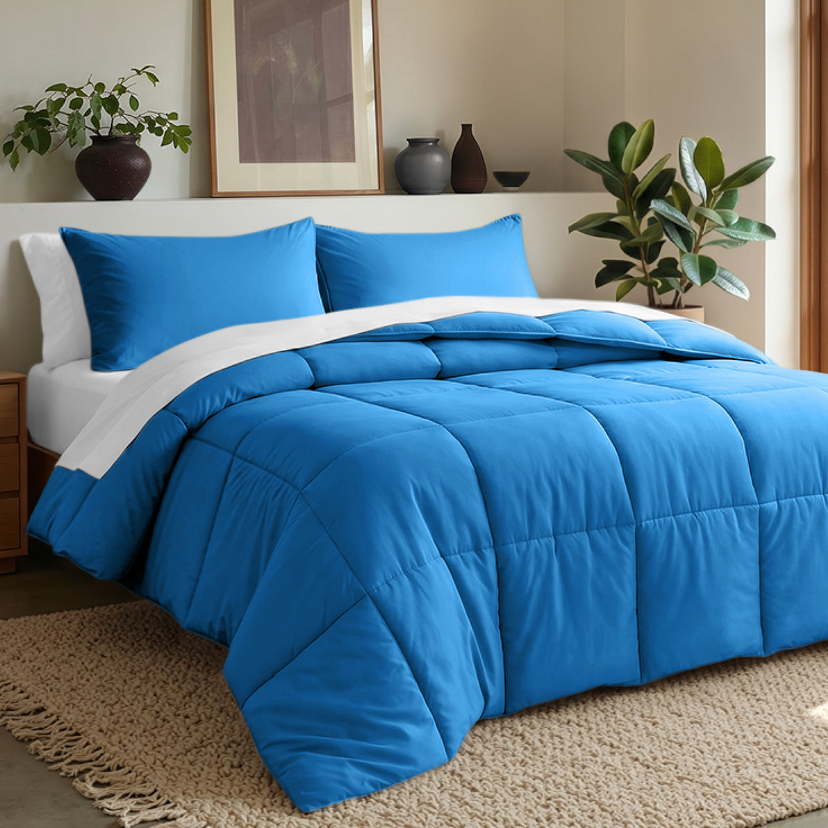 Comforter set on a bed in a bedroom with plants and decor.