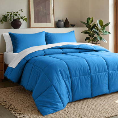 Comforter set on a bed in a bedroom with plants and decor.