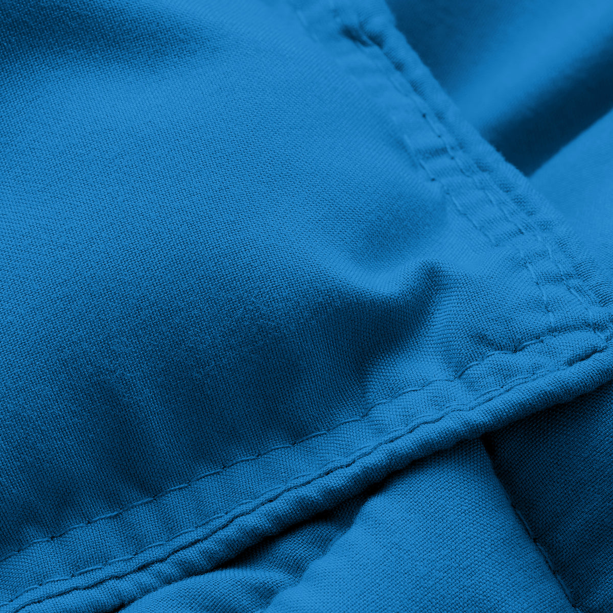 Close-up of comforter fabric with stitching detail