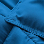Close-up of comforter fabric with stitching detail