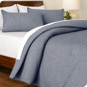 A comforter set on a bed