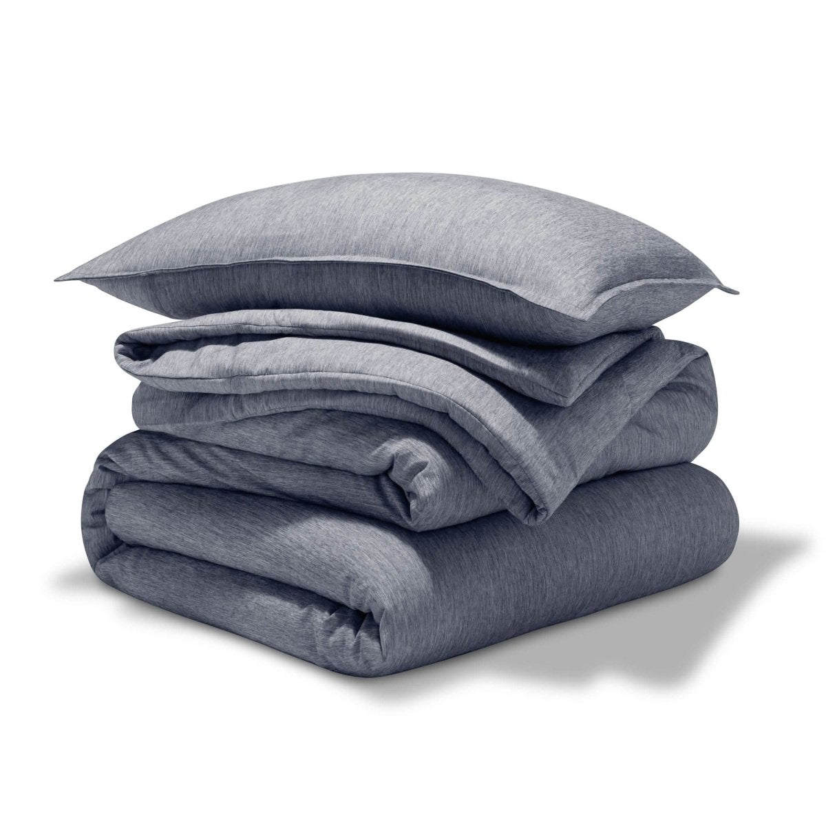 A comforter set folded and stacked