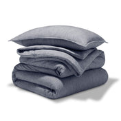 A comforter set folded and stacked