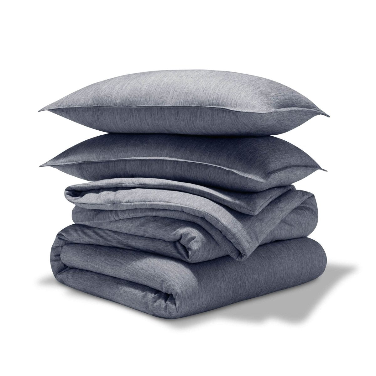 A comforter set folded and stacked