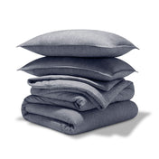 A comforter set folded and stacked