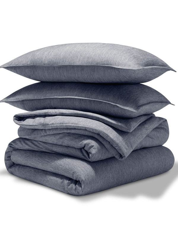 A comforter set folded and stacked
