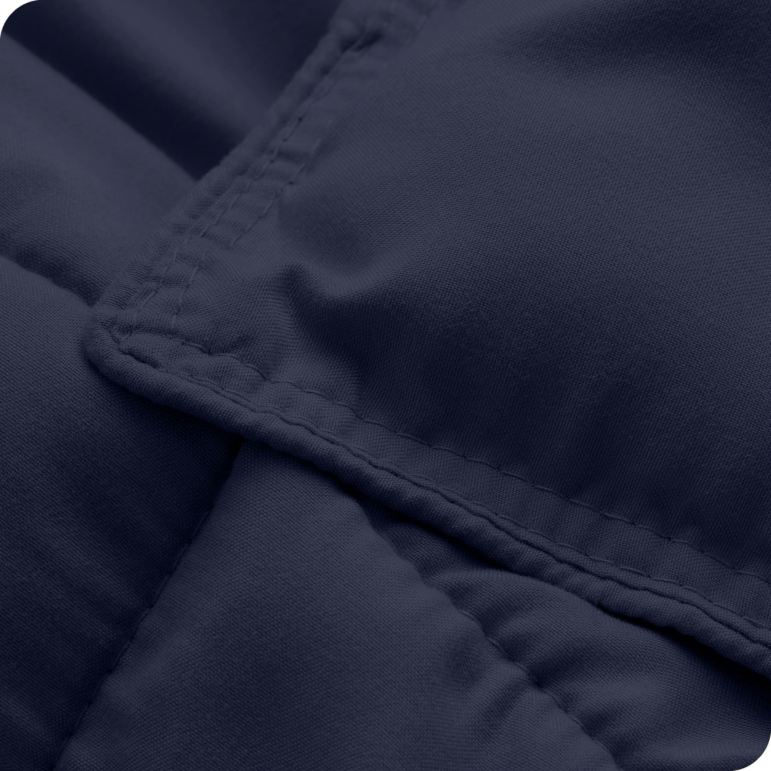 A close up of a corner of the microfiber comforter