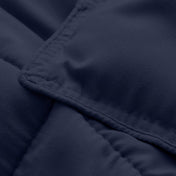 Close-up of comforter fabric with stitching detail