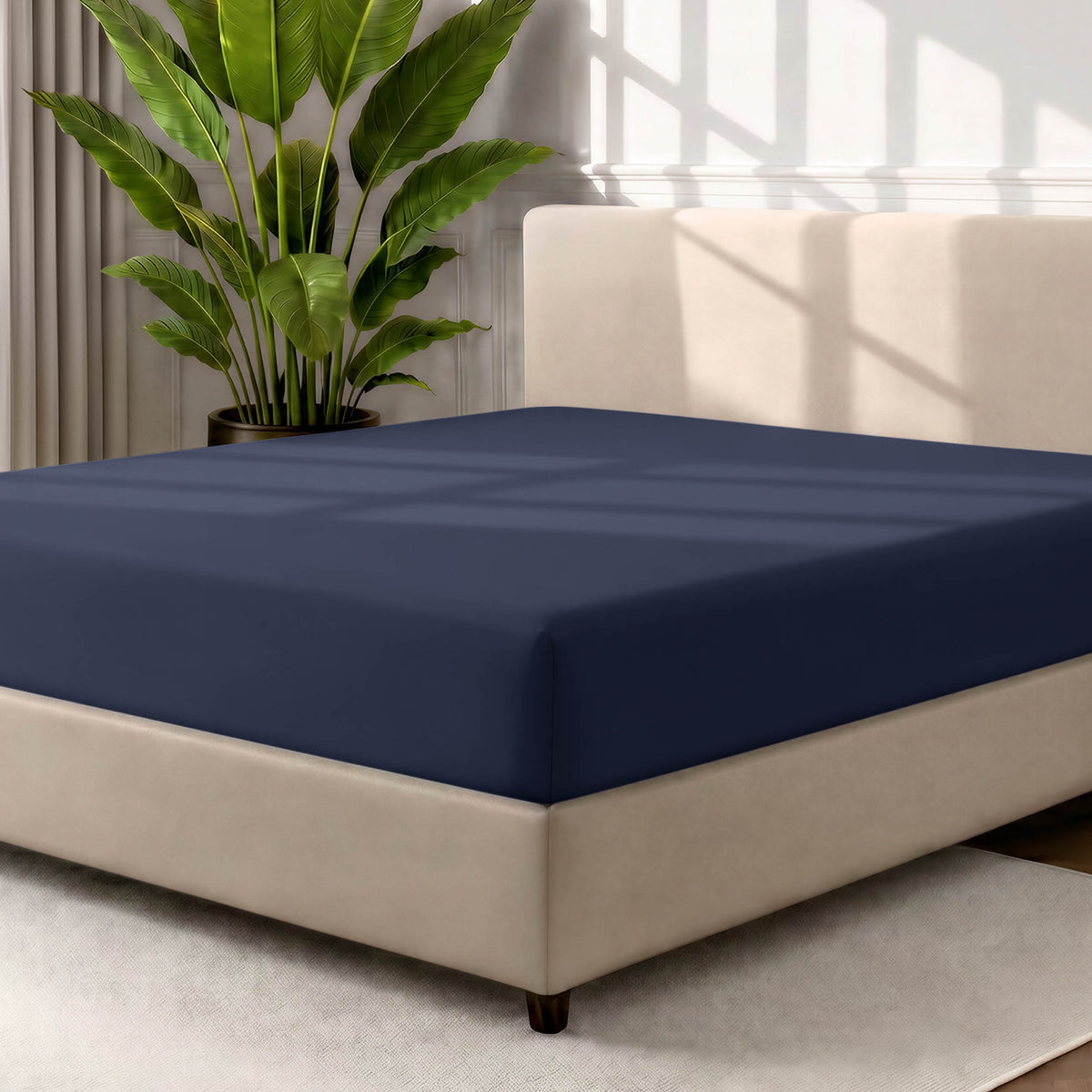 Ultra soft fitted sheet on a mattress with the sun shining into the bedroom