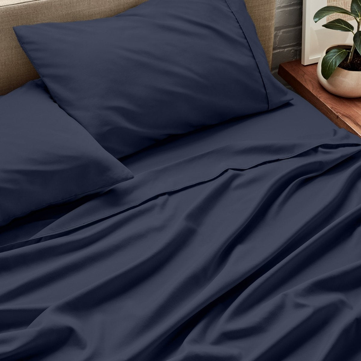 Close up of ultra-soft sheets on a bed