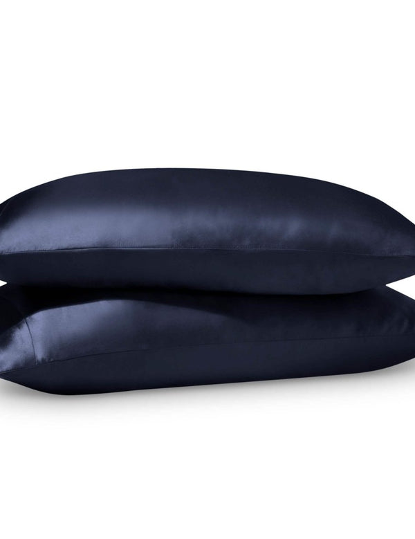 2 satin pillowcases on pillows stacked