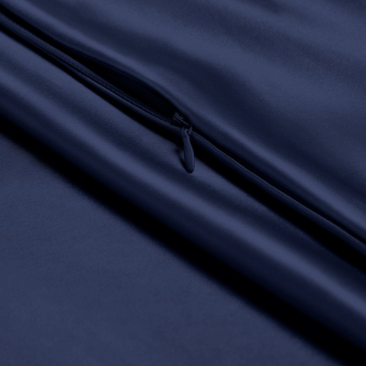 Close-up of poly satin pillowcase with a zipper