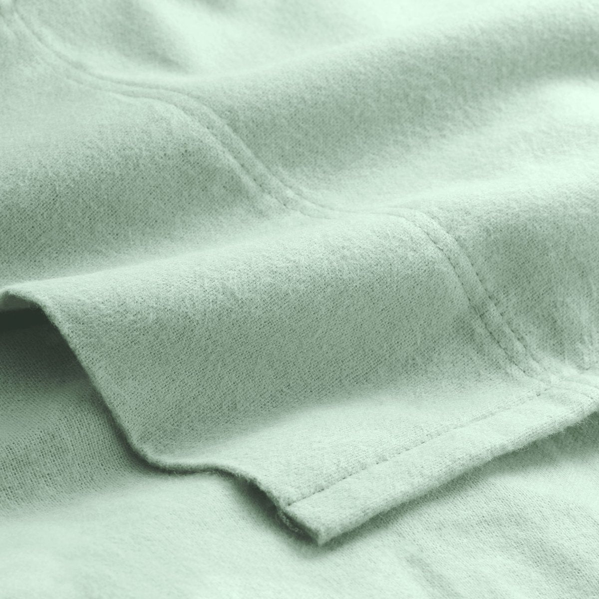 Close-up of flannel fabric with a focus on texture and color.