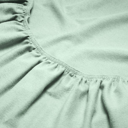 Close-up of a flannel fitted sheet with gathered elastic