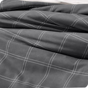 Close up of the modern plaid comforter fabric