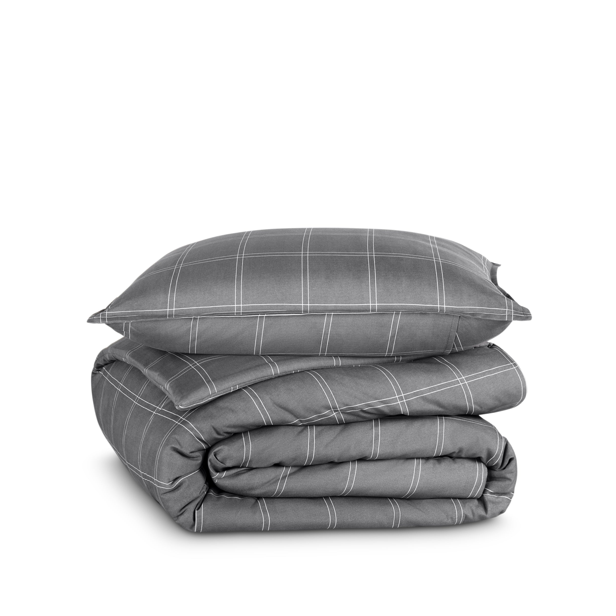 A printed comforter set folded and stacked