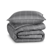 A comforter set folded and stacked