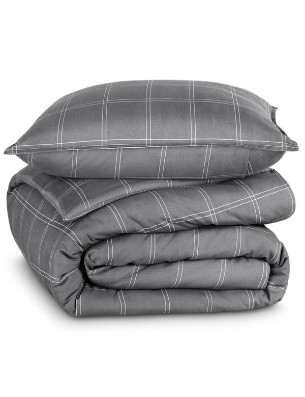 A comforter set folded and stacked