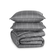 A comforter set folded and stacked