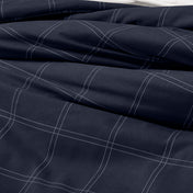 Close-up of comforter on a bed