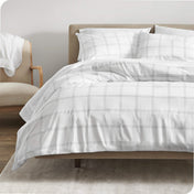 Modern plaid comforter set on a bed